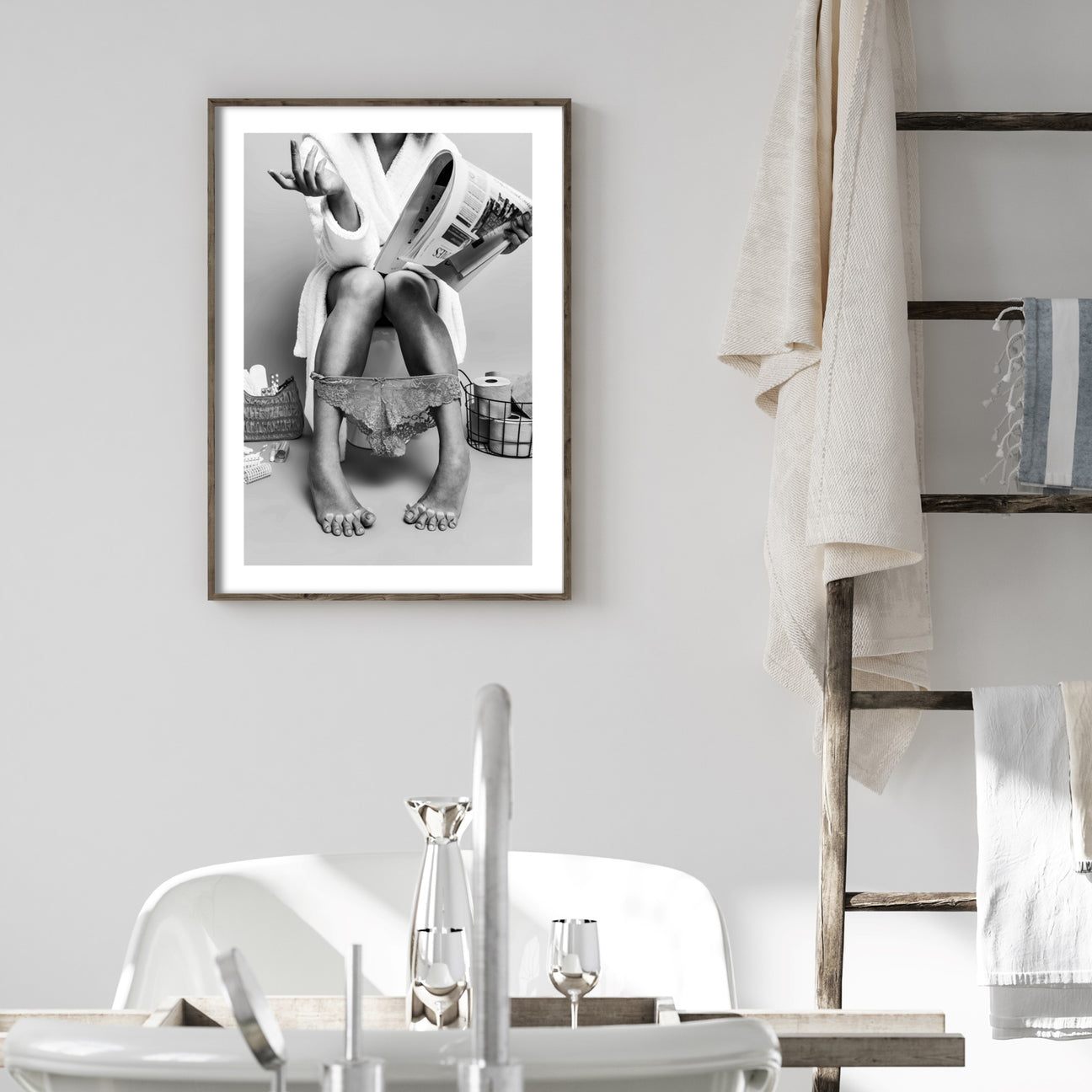 bathroom poster of a woman reading a newspaper on the toilet