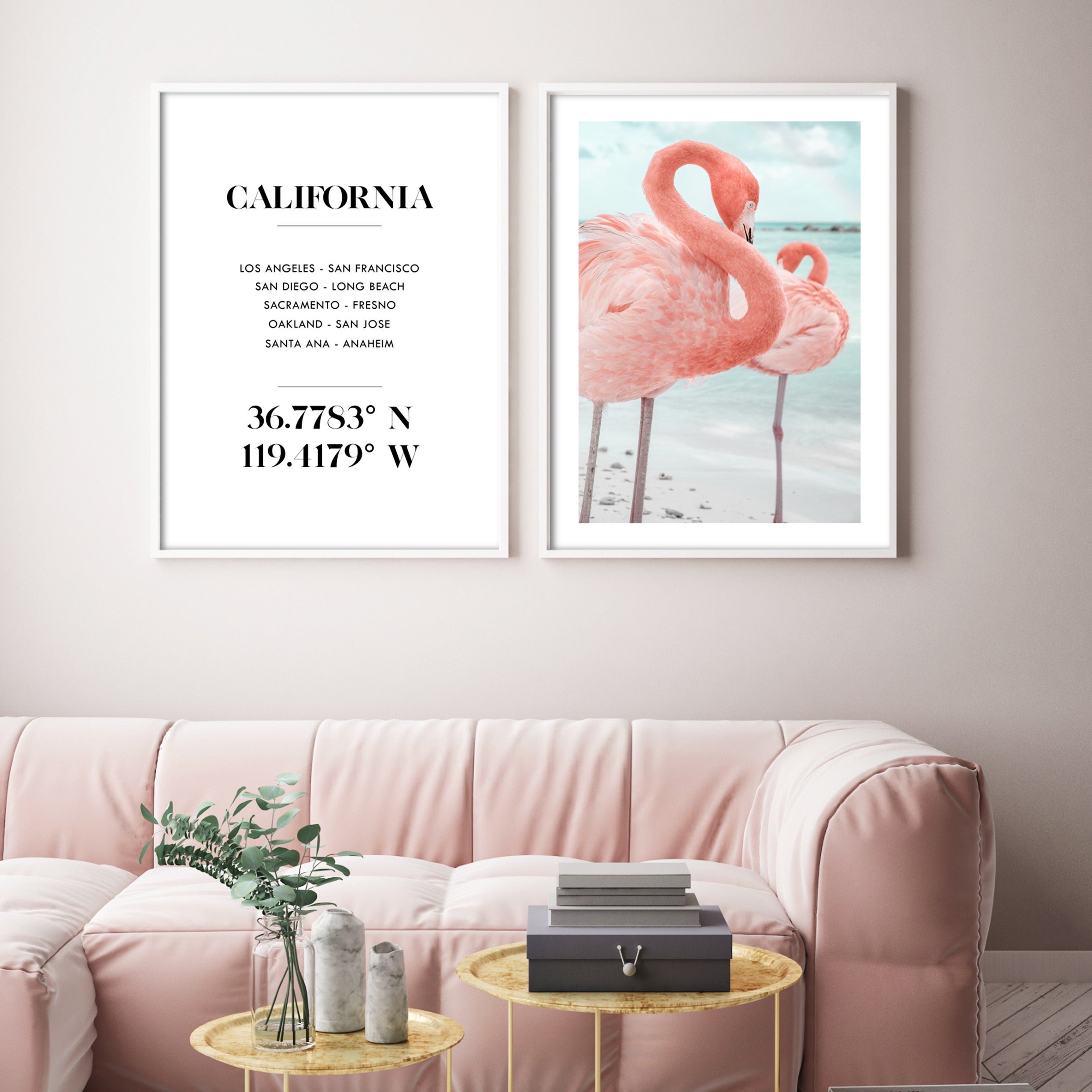 Two Flamingos standing up on a white sand beach and ocean blue water print in a pink themed room with pink sofa