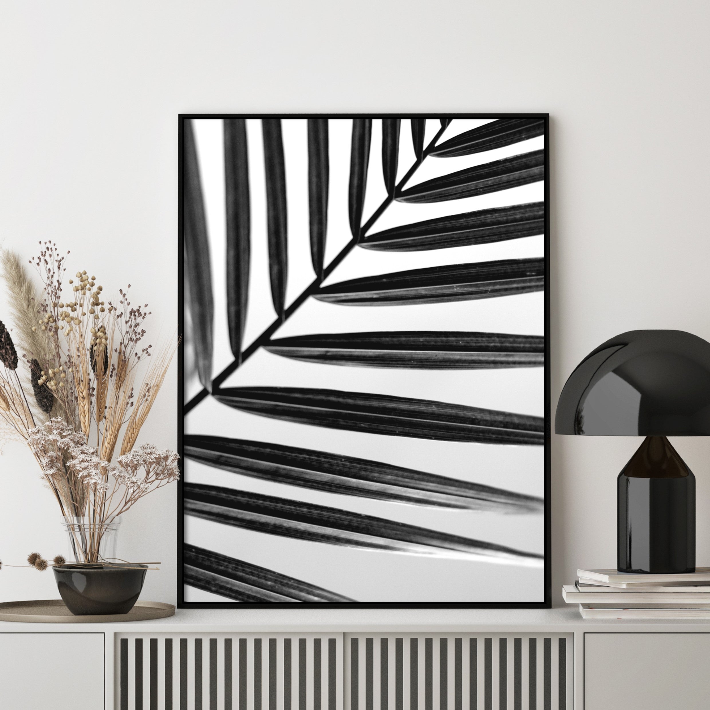 palm leaf poster in black and white in modern home