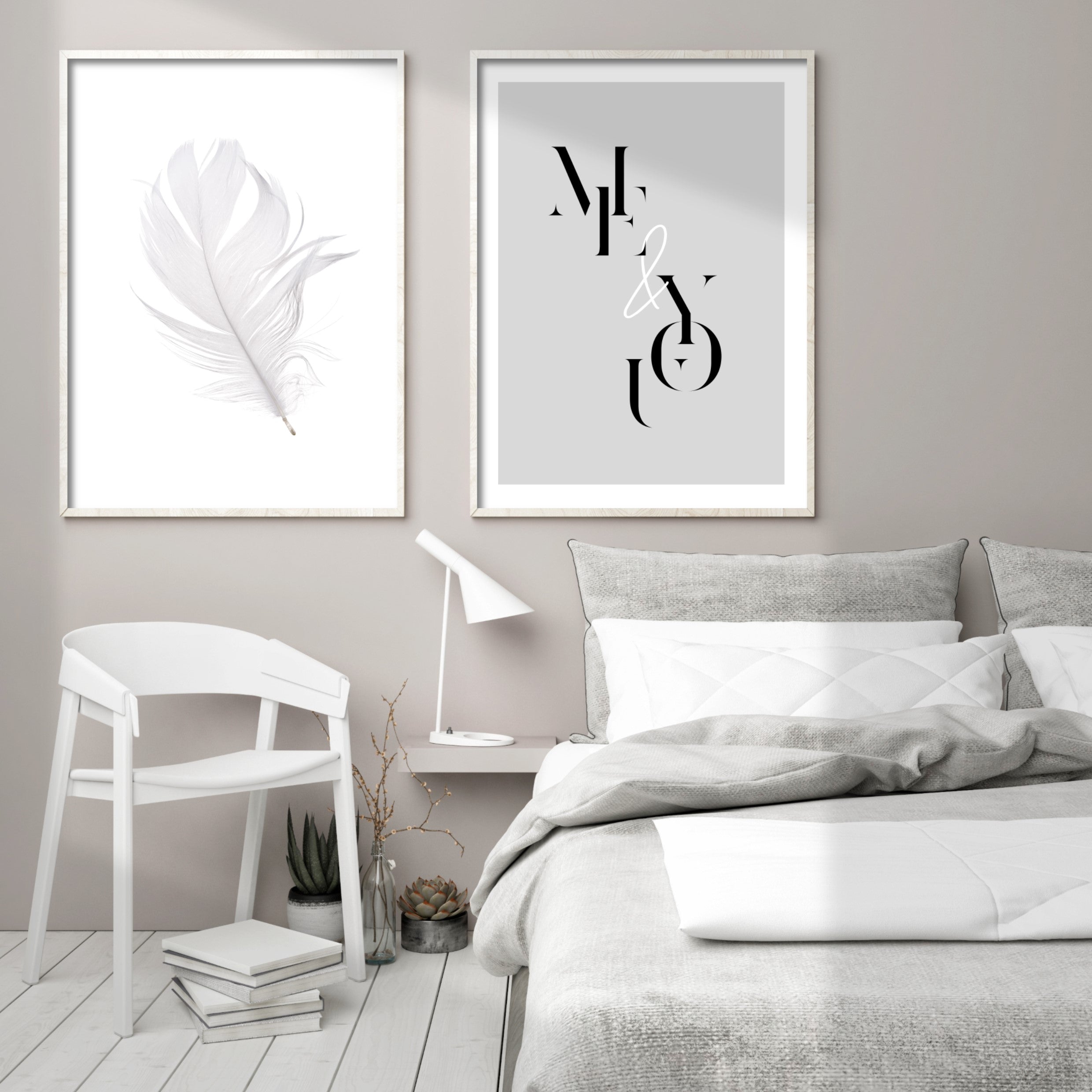 grey bedroom with grey and white posters in white wood frames