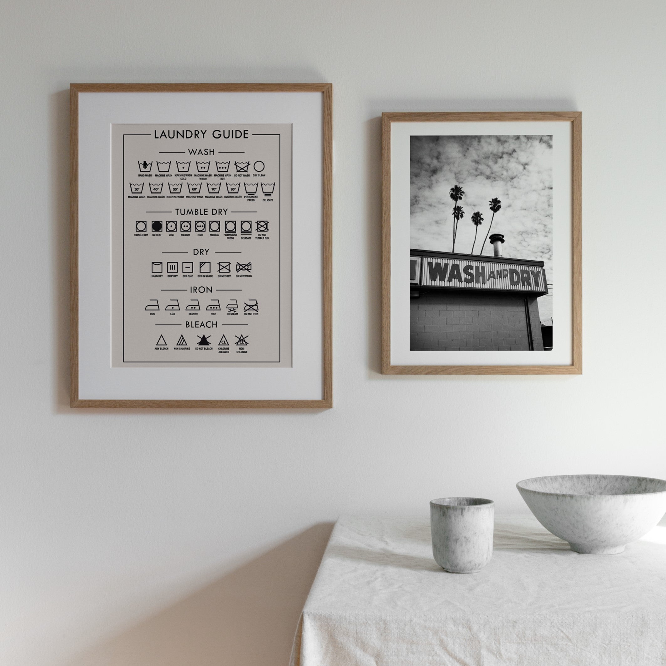 beige laundry guide wall art in white utility room