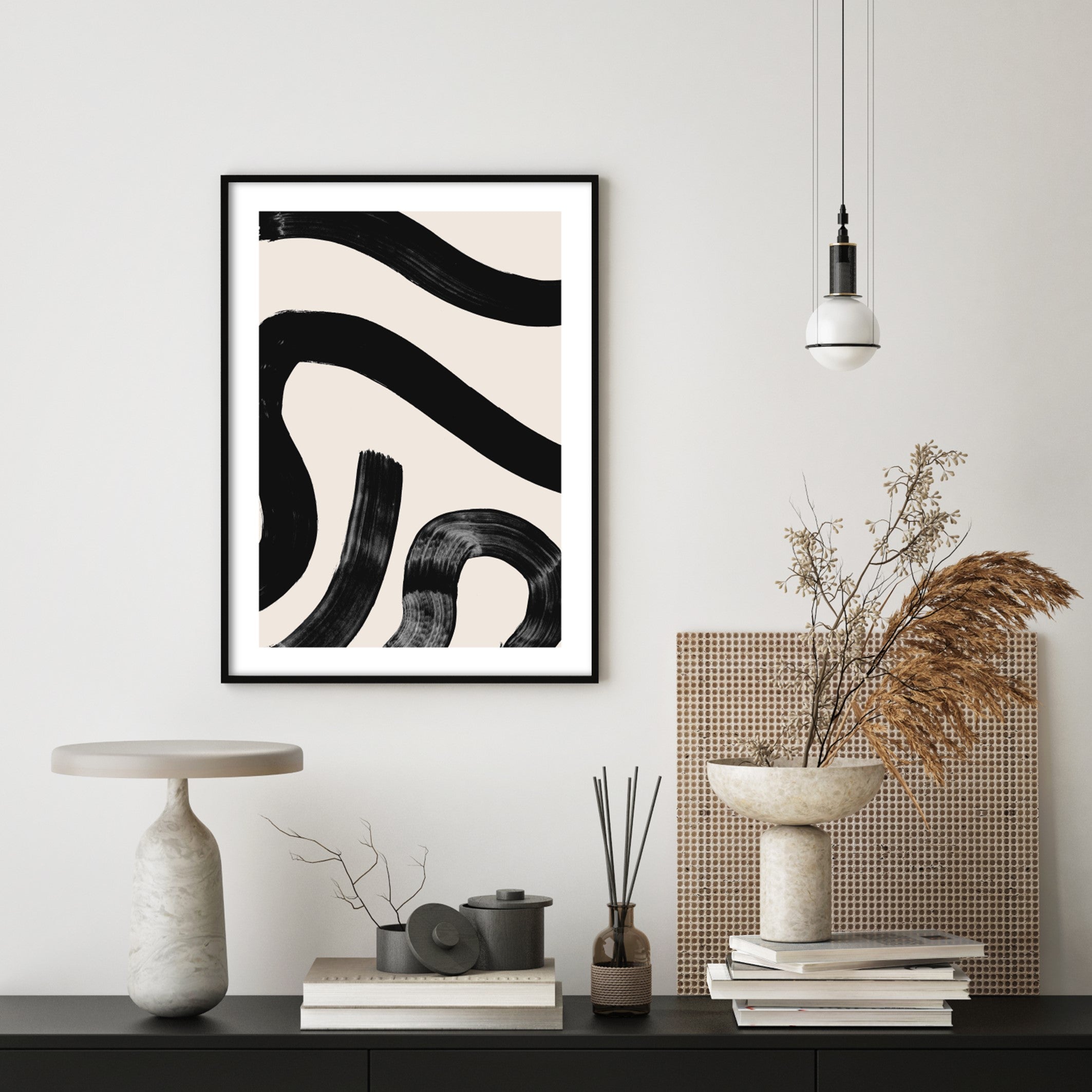 abstract black curves wall art in japandi living room