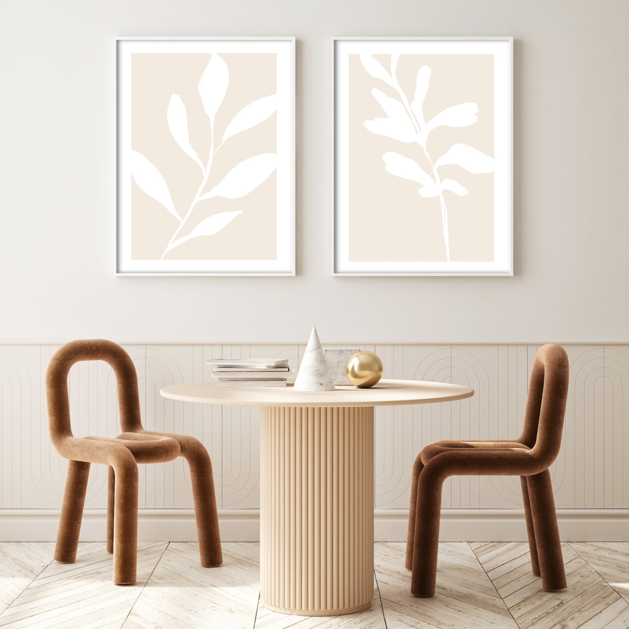 white botanical wall art in a beige dining room