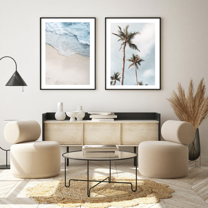 blue beach themed wall art in neutral boho living room