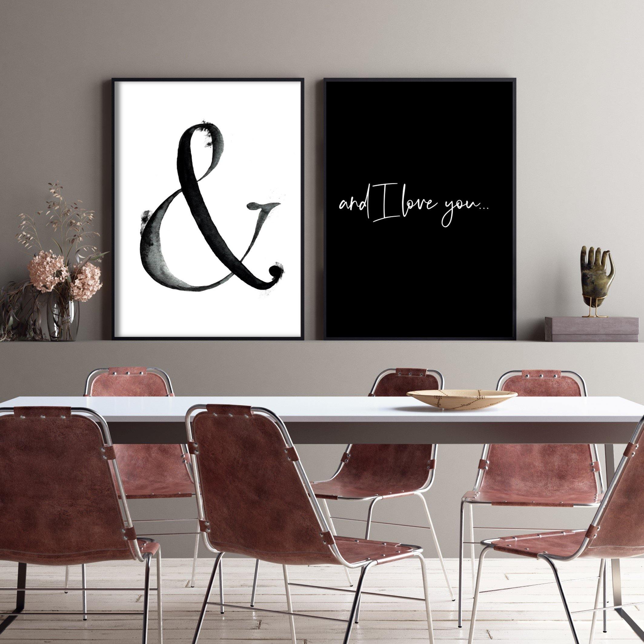 monochrome posters in modern dining room