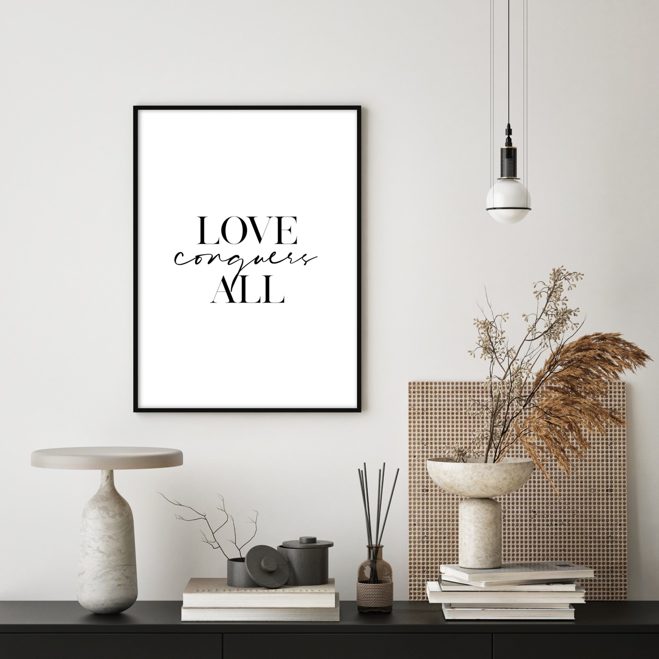 love conquers all poster in boho living room