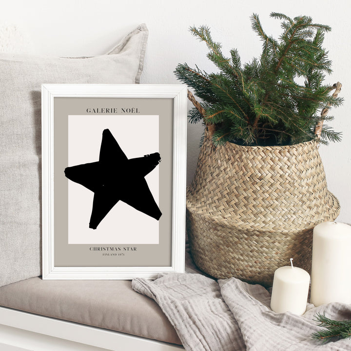 christmas star poster in white picture frame