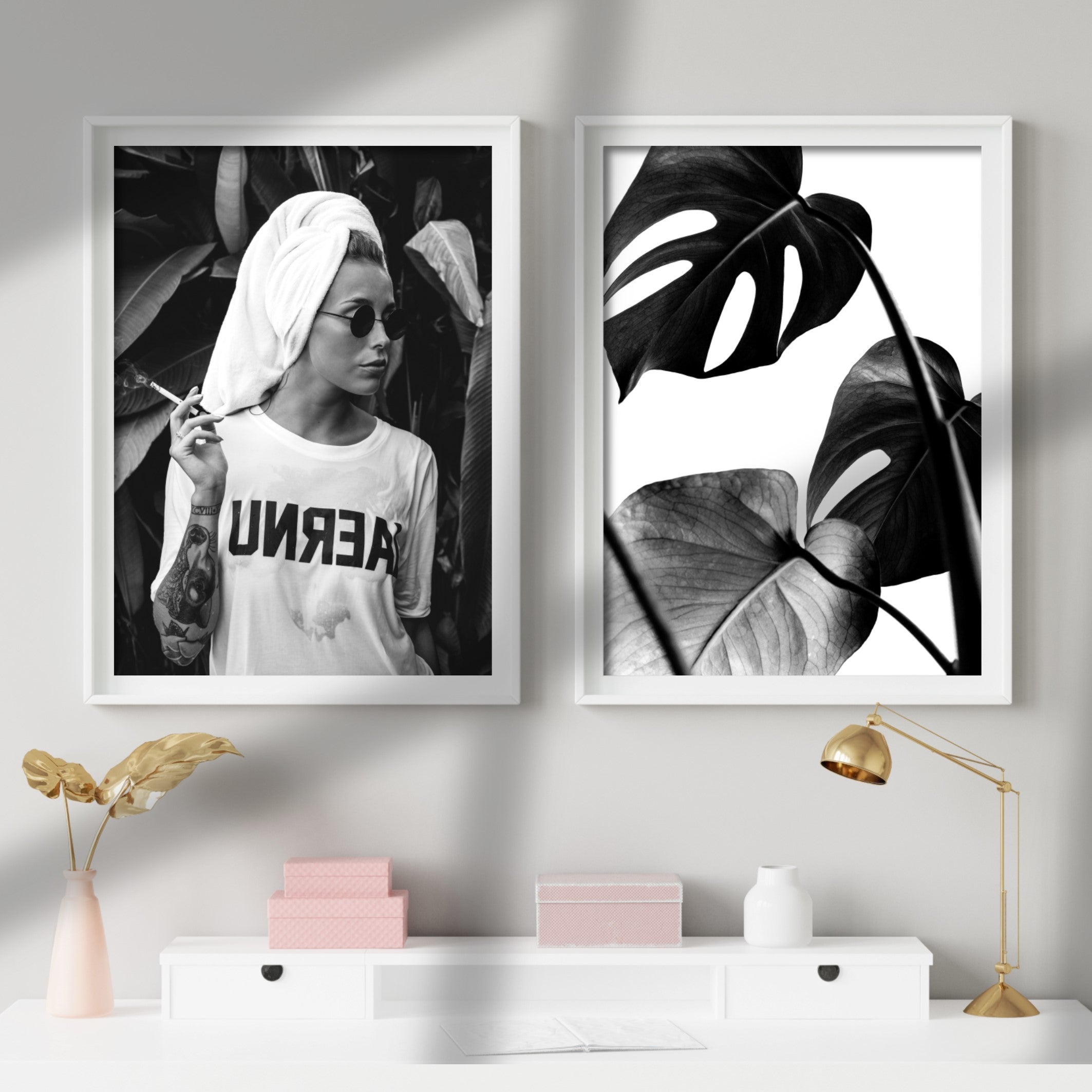 black and white stylish wall art in white picture frames