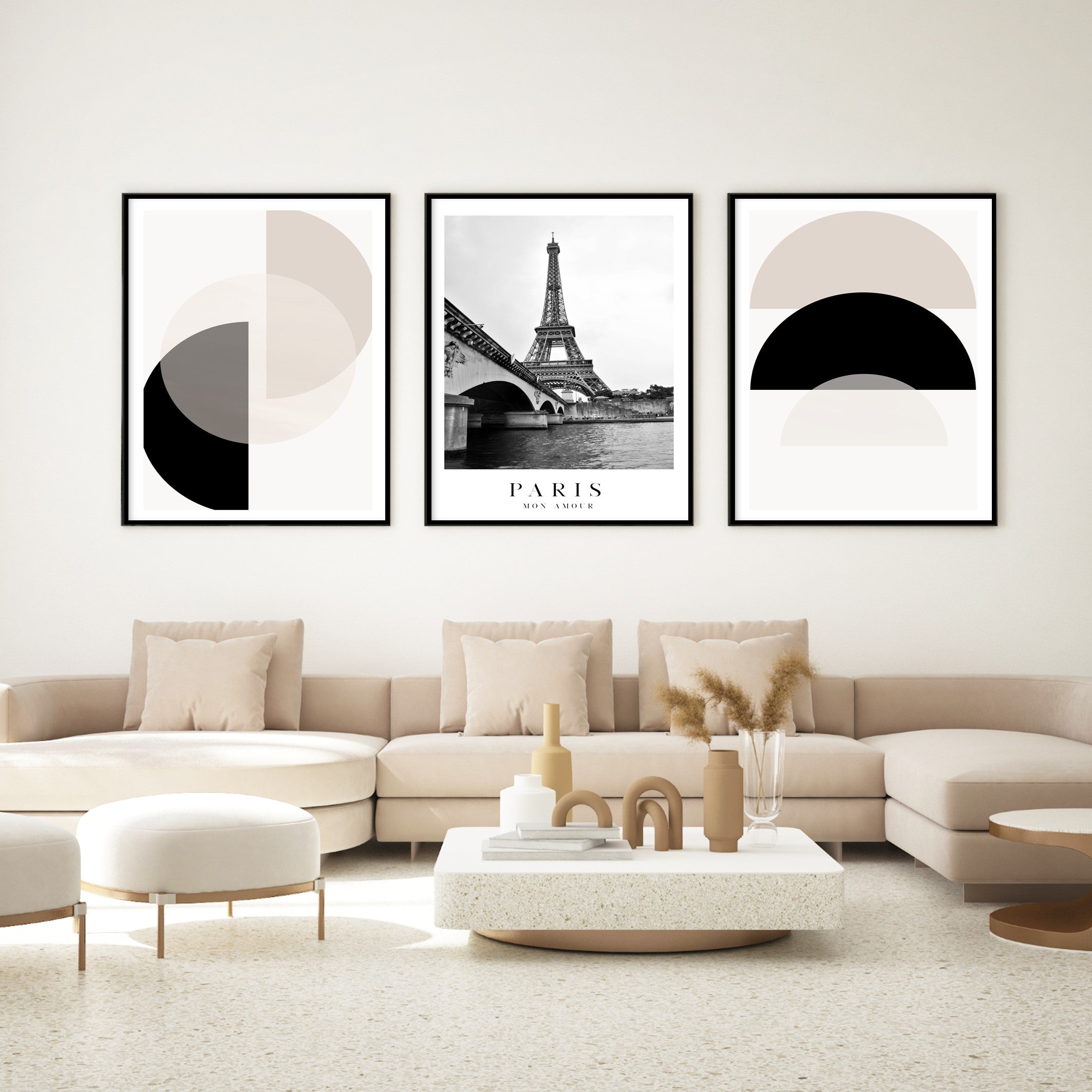 black and beige geometric wall prints in neutral living room