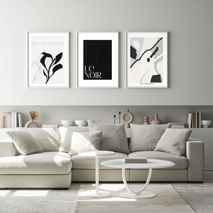 grey and black wall art in grey living room