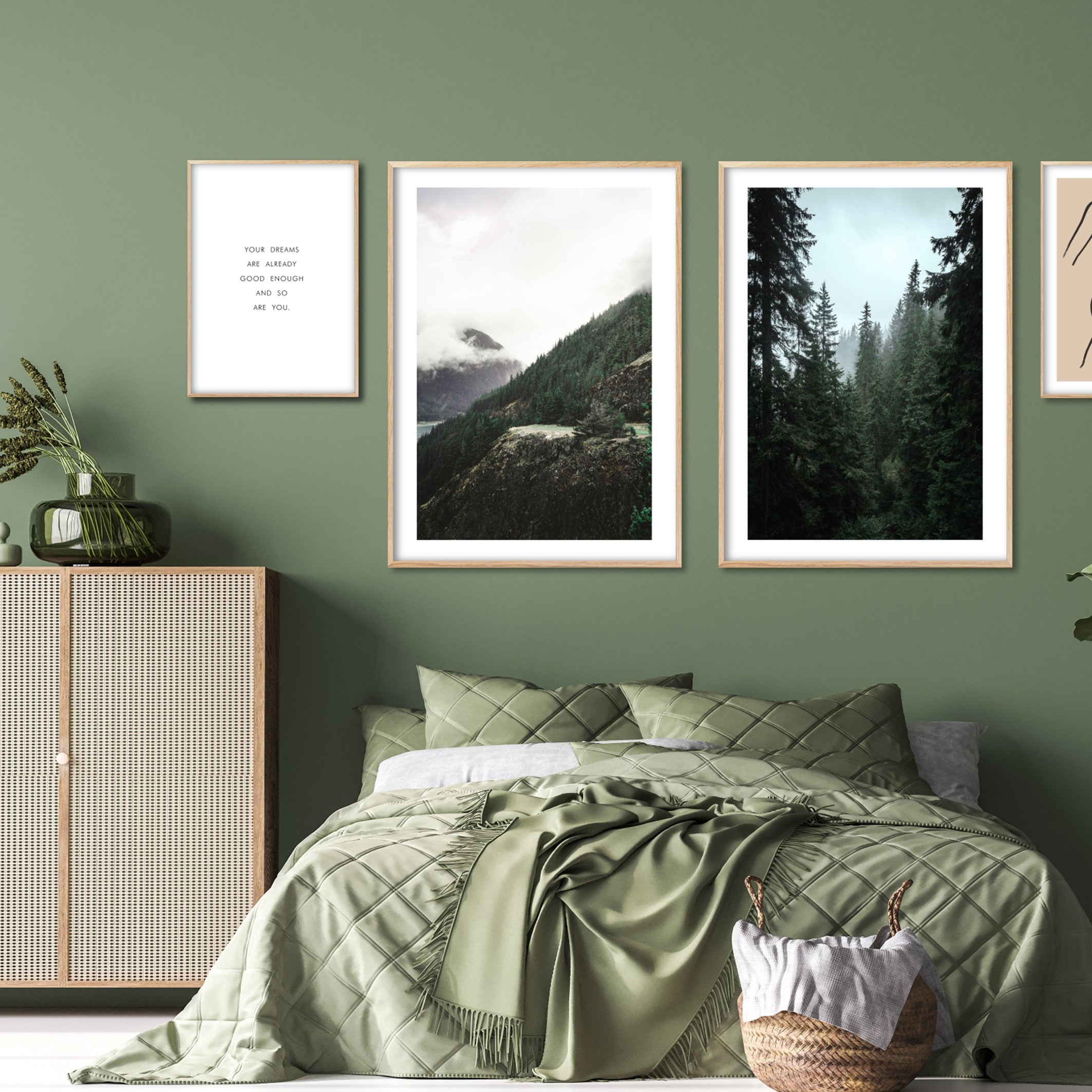 Posters in a modern green bedroom with Oak poster frames